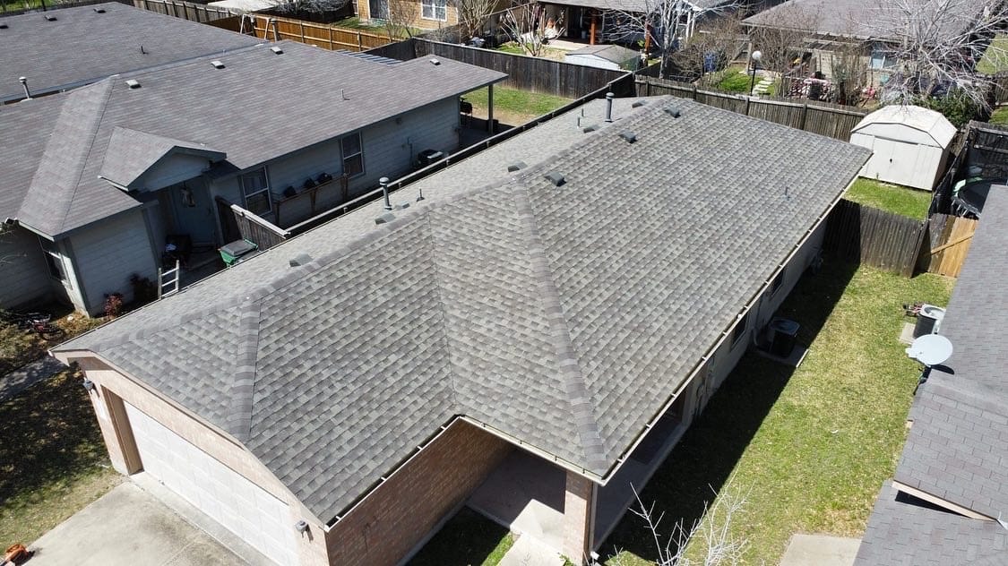 Aerial view of a residential roof showcasing premium roofing materials, highlighting the quality and craftsmanship of Cool Roofs' roofing services in San Antonio.