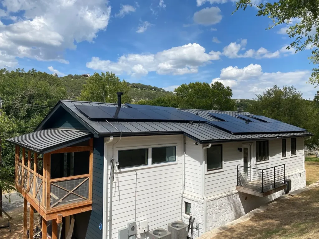 Solar panel installation by Cool Roofs on a Texas residential roof, reducing energy bills.