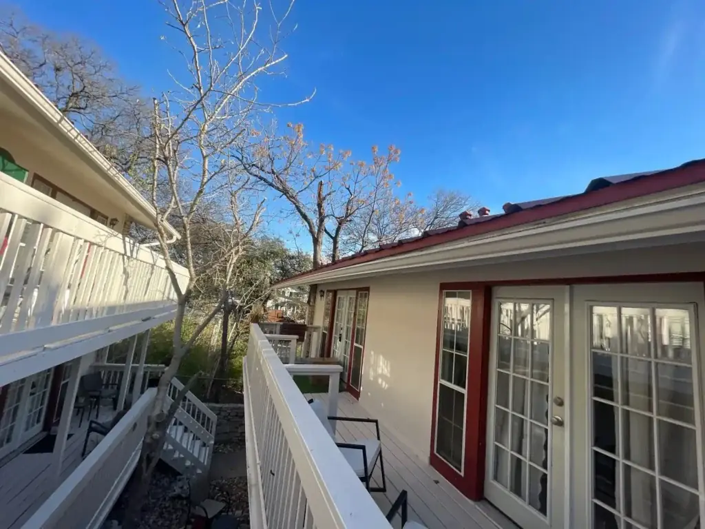Austin condo community with restored metal roof and updated exterior details.