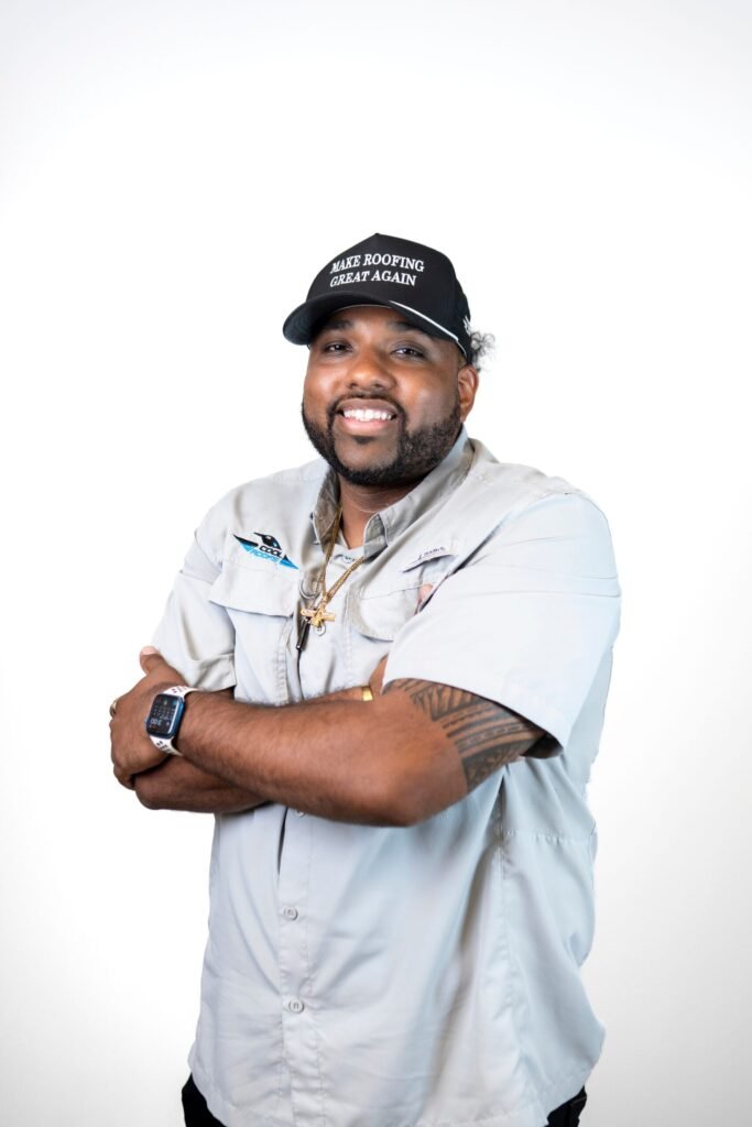 Cool Roofs team member, roofing specialist, wearing company hat and uniform.