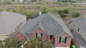 Aerial view of residential roof showcasing quality roofing installation and repair services.