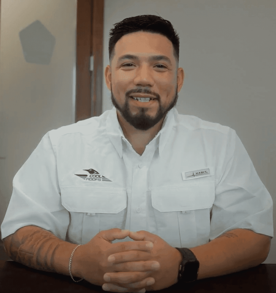 Joseph Valverde, San Antonio Market Manager for Cool Roofs, smiling and looking at the camera