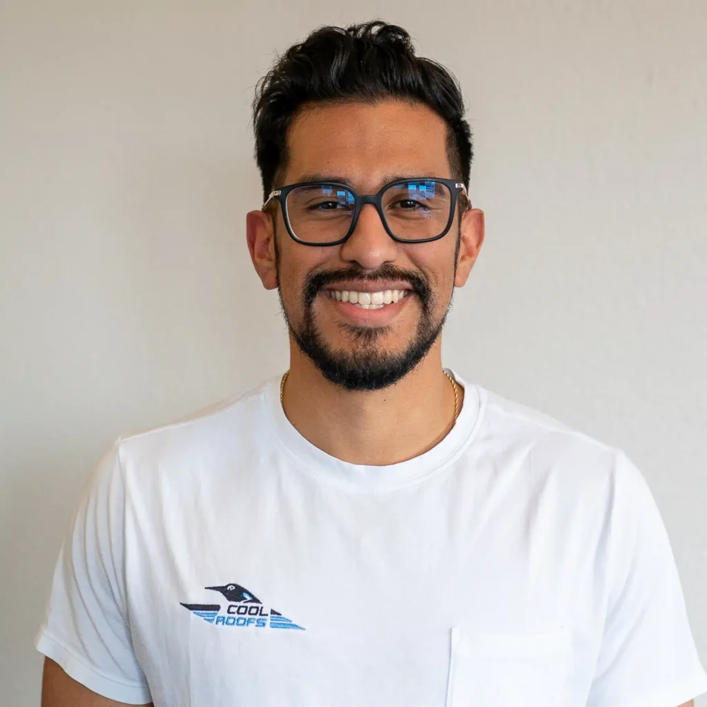 Trey Martinez, VP of Marketing for Cool Roofs, smiling headshot.