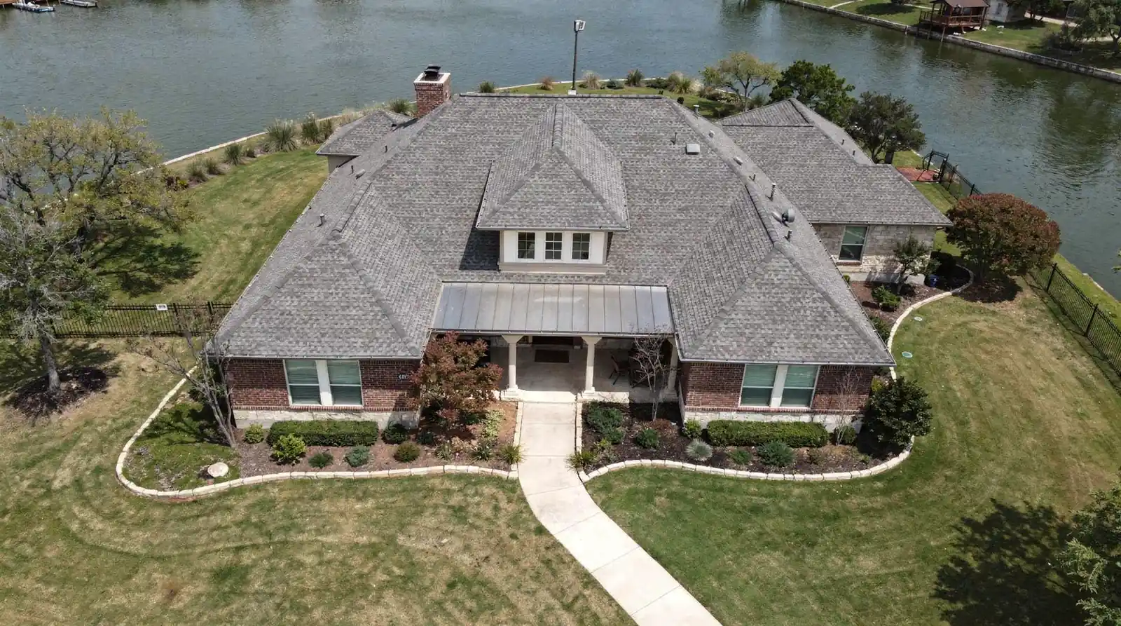 Custom Austin luxury homes often feature resort-style amenities like courtyards and summer kitchens